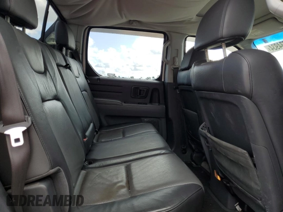 2006 Honda Ridgeline RTL with VIN 2HJYK16586H530898, listed as a Copart auction lot 77734934 with 137,560 mi miles and Clean Title. Bid and sale history available at carsss.com. Image 10.
