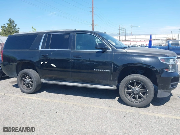 2015 Chevrolet Suburban LT with VIN 1GNSCJKC2FR281629, listed as a IAAI auction lot 41849300 with 133,842 mi miles. Bid and sale history available at carsss.com. Image 13.