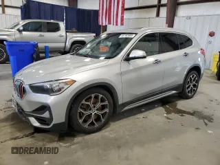 2020 BMW X1 xDrive28i with VIN WBXJG9C06L5P94397, listed as a Copart auction lot 46182585 with 74,244 mi miles and Salvage Title. Bid and sale history available at carsss.com. Image 1.