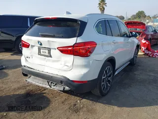 2022 BMW X1 sDrive28i with VIN WBXJG7C05N5U58988, listed as a IAAI auction lot 41466393 with 56,062 mi miles. Bid and sale history available at carsss.com. Image 4.