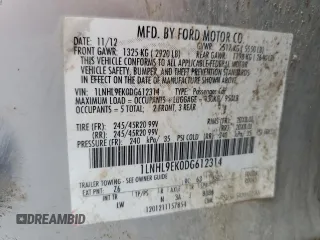 2013 Lincoln MKS with VIN 1LNHL9EK0DG612314, listed as a Copart auction lot 52901685 with 124,828 mi miles and Salvage title. Bid and sale history available at DreamBid. Image 13.