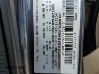 2015 Mazda 3 i Touring with VIN JM1BM1L74F1255247, listed as a Copart auction lot 60755455 with 102,554 mi miles and Salvage title. Bid and sale history available at DreamBid. Image 13.