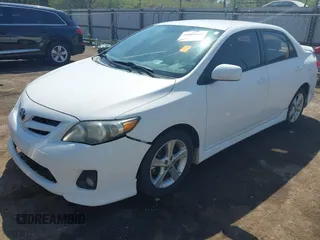 2013 Toyota Corolla L with VIN 2T1BU4EE4DC981499, listed as a IAAI auction lot 42052280 with 111,153 mi miles. Bid and sale history available at carsss.com. Image 2.