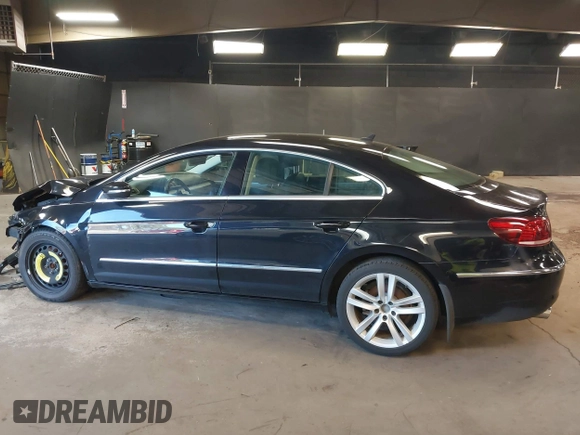 2015 Volkswagen CC R-Line with VIN WVWBP7AN8FE828106, listed as a IAAI auction lot 41867821 with 67,067 mi miles and . Bid and sale history available at DreamBid. Image 14.