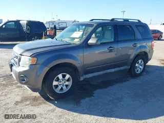 2009 Ford Escape Limited with VIN 1FMCU94G19KC45724, listed as a IAAI auction lot 41860671 with 188,520 mi miles. Bid and sale history available at carsss.com. Image 2.