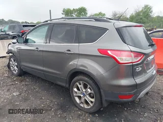 2013 Ford Escape SEL with VIN 1FMCU9HX4DUC75565, listed as a IAAI auction lot 42574351 with 180,876 mi miles and . Bid and sale history available at DreamBid. Image 3.