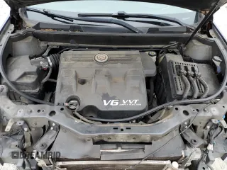 2015 Cadillac SRX Performance Collection with VIN 3GYFNCE38FS597717, listed as a Copart auction lot 57629615 with 102,689 mi miles and Salvage title. Bid and sale history available at DreamBid. Image 12.