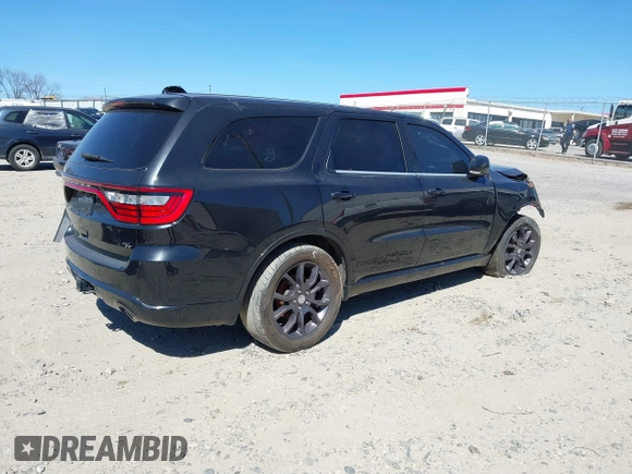 2015 Dodge Durango R/T with VIN 1C4SDHCT2FC222659, listed as a IAAI auction lot 41606664 with 122,321 mi miles and . Bid and sale history available at DreamBid. Image 4.