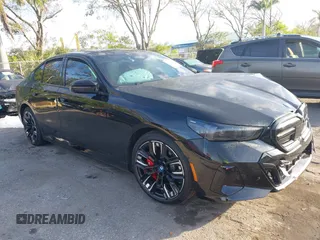 2024 BMW i5 M60 with VIN WBY43FK01RCR33165, listed as a IAAI auction lot 41168265 with 3,352 mi miles. Bid and sale history available at carsss.com. Image 1.
