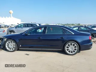 2013 Audi A8 L 4.0L with VIN WAUR2AFD3DN012893, listed as a IAAI auction lot 41209419 with 116,990 mi miles. Bid and sale history available at carsss.com. Image 14.