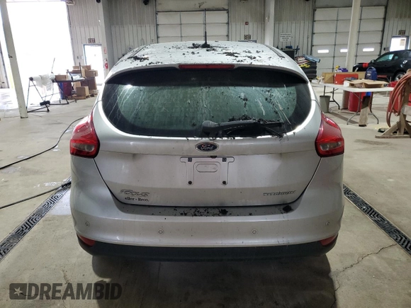 2017 Ford Focus Titanium с VIN 1FADP3N20HL274033, выставлен на аукционе Copart как лот 57295925 с пробегом Не указан миль и Списание • Salvage title. История ставок и продаж доступна на DreamBid. Изображение 6.