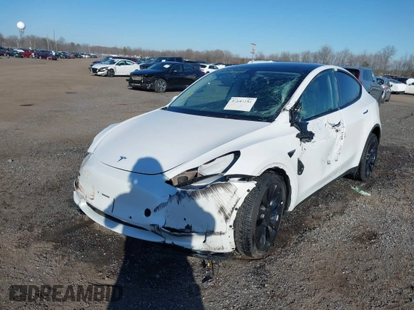 2022 Tesla Model Y Performance with VIN 7SAYGDEF5NF542189, listed as a IAAI auction lot 41643254 with 18,865 mi miles and . Bid and sale history available at DreamBid. Image 6.