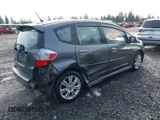 2011 Honda Fit Sport z VIN JHMGE8H54BC000162, wystawiony jako IAAI lot #41665321 z przebiegiem 154 531 mil mil oraz . Historia ofert i sprzedaży dostępna na DreamBid. Obrazek 4.