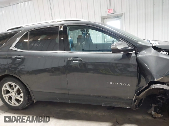 2019 Chevrolet Equinox Premier with VIN 2GNAXXEV2K6127055, listed as a IAAI auction lot 41598381 with 132,126 mi miles and . Bid and sale history available at DreamBid. Image 13.