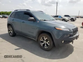 2014 Jeep Cherokee Trailhawk with VIN 1C4PJMBS0EW185737, listed as a Copart auction lot 63463015 with 199,983 mi miles and Clean title. Bid and sale history available at DreamBid. Image 4.