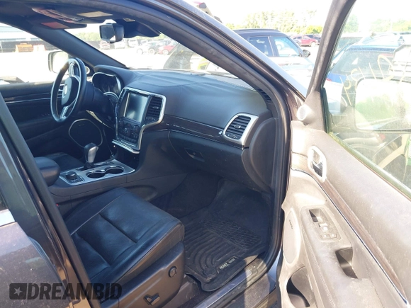 2016 Jeep Grand Cherokee Overland with VIN 1C4RJFCGXGC443961, listed as a IAAI auction lot 42639434 with 122,216 mi miles and . Bid and sale history available at DreamBid. Image 5.