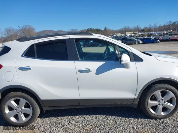 2016 Buick Encore Leather with VIN KL4CJGSB8GB543252, listed as a IAAI auction lot 41489764 with 82,220 mi miles. Bid and sale history available at carsss.com. Image 14.