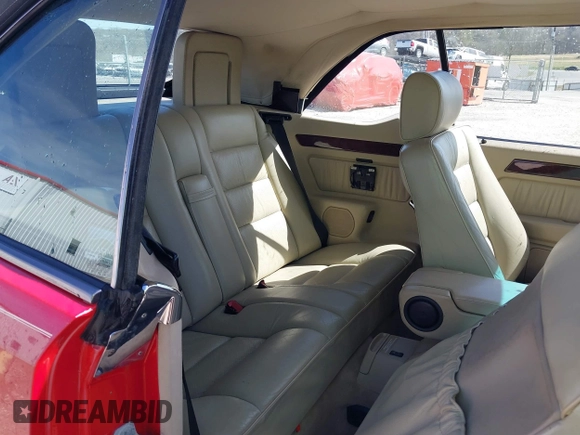 1993 Mercedes-Benz E Class with VIN WDBEA66E7PB881589, listed as a IAAI auction lot 41808158 with 81,268 mi miles. Bid and sale history available at carsss.com. Image 8.