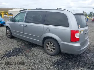 2013 Chrysler Town & Country Touring with VIN 2C4RC1BG2DR656629, listed as a IAAI auction lot 42024459 with 209,472 mi miles and . Bid and sale history available at DreamBid. Image 3.