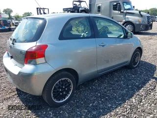 2011 Toyota Yaris with VIN JTDJT4K37B5336583, listed as a IAAI auction lot 39745031 with 229,326 mi miles. Bid and sale history available at carsss.com. Image 4.