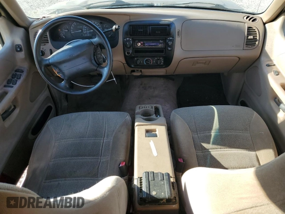 1999 Ford Explorer XL with VIN 1FMZU34X2XUA28059, listed as a Copart auction lot 77668294 with 131,064 mi miles and Salvage title. Bid and sale history available at DreamBid. Image 8.