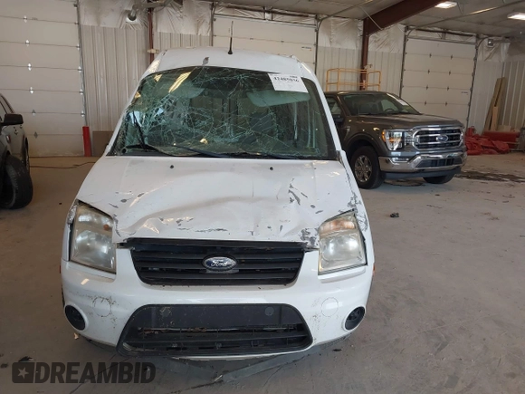 2013 Ford Transit Connect XLT z VIN NM0LS6BN7DT158257, wystawiony jako IAAI lot #42485036 z przebiegiem 120 492 mil mil oraz . Historia ofert i sprzedaży dostępna na DreamBid. Obrazek 6.