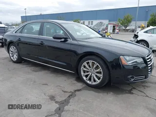 2012 Audi A8 L with VIN WAURVAFD7CN005452, listed as a IAAI auction lot 41529084 with 80,738 mi miles. Bid and sale history available at carsss.com. Image 1.