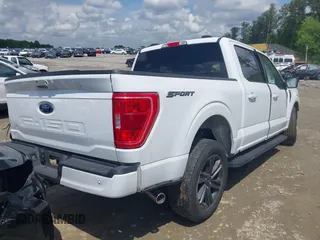 2023 Ford F-150 XL with VIN 1FTEW1C52PFC29031, listed as a IAAI auction lot 42103155 with 55,479 mi miles and . Bid and sale history available at DreamBid. Image 4.