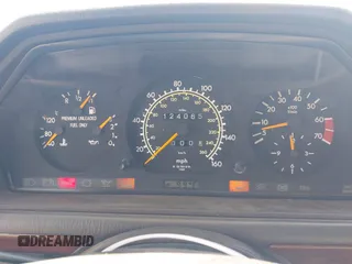 1993 Mercedes-Benz 400 with VIN WDBEA34E6PB942402, listed as a IAAI auction lot 41855899 with 124,065 mi miles. Bid and sale history available at carsss.com. Image 7.