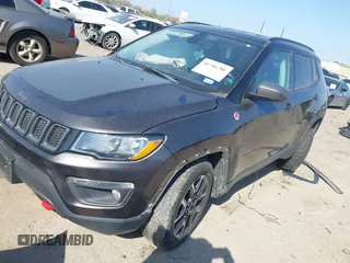 2019 Jeep Compass Trailhawk with VIN 3C4NJDDBXKT811171, listed as a IAAI auction lot 41786708 with 107,697 mi miles and . Bid and sale history available at carsss.com. Image 2.