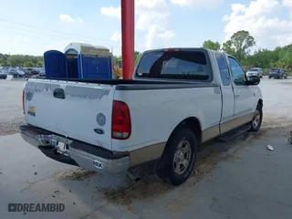 1999 Ford F-150 Work Series with VIN 1FTRX17W5XNB33627, listed as a IAAI auction lot 41933365 with 207,118 mi miles. Bid and sale history available at carsss.com. Image 4.