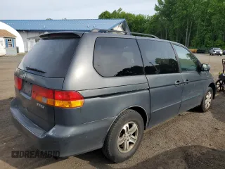2004 Honda Odyssey EX-RES z VIN 5FNRL188X4B115002, wystawiony jako Copart lot #57883945 z przebiegiem Nie podano mil oraz Szkoda całkowita • Salvage title. Historia ofert i sprzedaży dostępna na DreamBid. Obrazek 3.
