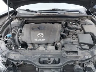 2014 Mazda 3 s Touring with VIN JM1BM1L35E1208952, listed as a IAAI auction lot 42121077 with 183,985 mi miles. Bid and sale history available at carsss.com. Image 10.