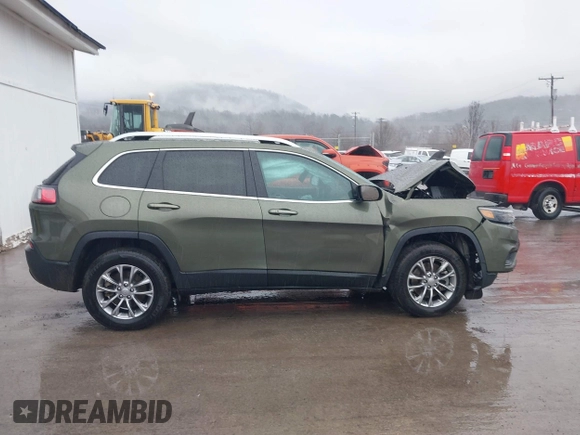 2021 Jeep Cherokee Latitude Lux with VIN 1C4PJMMX2MD106071, listed as a IAAI auction lot 41459872 with 79,471 mi miles and . Bid and sale history available at DreamBid. Image 12.