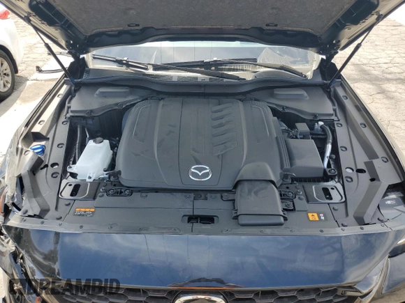 2025 Mazda CX-90 Premium Sport z VIN JM3KKCHD0S1218357, wystawiony jako Copart lot #57452545 z przebiegiem 1 097 mil mil oraz Szkoda całkowita • Salvage title. Historia ofert i sprzedaży dostępna na DreamBid. Obrazek 7.