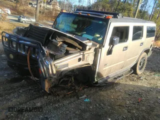 2003 Hummer H2 with VIN 5GRGN23U33H110037, listed as a IAAI auction lot 41339142 with 166,795 mi miles. Bid and sale history available at carsss.com. Image 2.