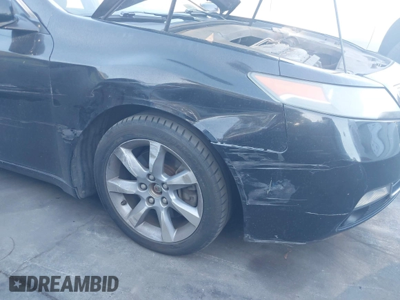2012 Acura TL Auto z VIN 19UUA8F28CA030742, wystawiony jako IAAI lot #41870304 z przebiegiem 175 670 mil mil oraz . Historia ofert i sprzedaży dostępna na DreamBid. Obrazek 6.