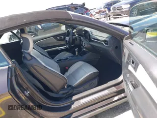 2024 Ford Mustang EcoBoost with VIN 1FAGP8UH9R5123133, listed as a IAAI auction lot 42538350 with 33,581 mi miles and . Bid and sale history available at DreamBid. Image 5.