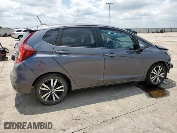 2018 Honda Fit EX with VIN 3HGGK5H88JM707976, listed as a Copart auction lot 58777715 with 83,651 mi miles and Salvage title. Bid and sale history available at DreamBid. Image 3.