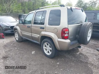 2005 Jeep Liberty Limited z VIN 1J4GK58K05W593417, wystawiony jako IAAI lot #41811582 z przebiegiem 116 027 mil mil oraz . Historia ofert i sprzedaży dostępna na DreamBid. Obrazek 3.