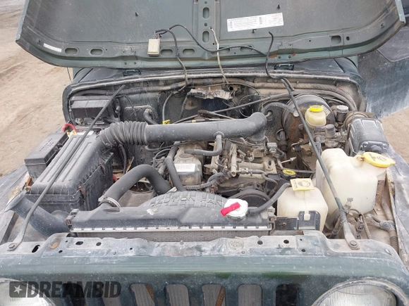 1998 Jeep Wrangler Sport with VIN 1J4FY19S9WP722431, listed as a IAAI auction lot 41872702 with 197,503 mi miles and . Bid and sale history available at DreamBid. Image 10.