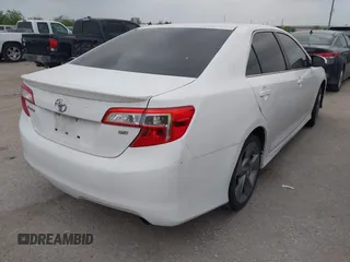 2014 Toyota Camry L with VIN 4T1BF1FK1EU851712, listed as a IAAI auction lot 41940311 with 158,097 mi miles. Bid and sale history available at carsss.com. Image 4.