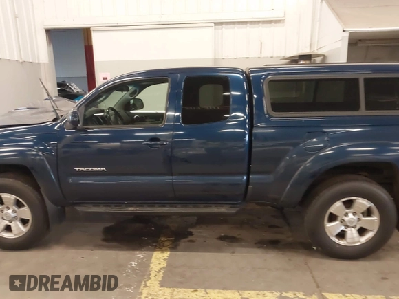 2006 Toyota Tacoma with VIN 5TEUU42N06Z265256, listed as a IAAI auction lot 41371660 with 153,557 mi miles. Bid and sale history available at carsss.com. Image 15.