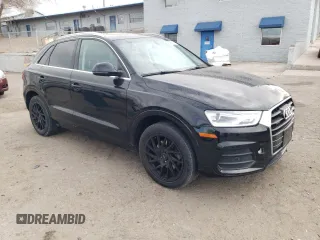 2016 Audi Q3 Premium Plus with VIN WA1EFCFS5GR000591, listed as a Copart auction lot 45585415 with 87,303 mi miles and Salvage title. Bid and sale history available at DreamBid. Image 4.