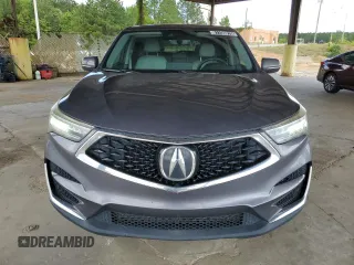2020 Acura RDX Technology with VIN 5J8TC1H54LL004003, listed as a Copart auction lot 61156075 with 135,236 mi miles and Clean title. Bid and sale history available at DreamBid. Image 5.