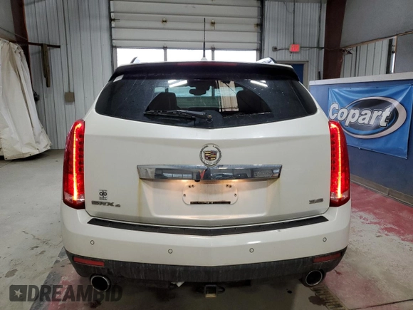 2013 Cadillac SRX Performance Collection with VIN 3GYFNHE36DS520905, listed as a Copart auction lot 47961515 with 128,523 mi miles and Salvage Title. Bid and sale history available at carsss.com. Image 6.