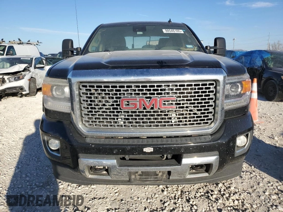 2015 GMC Sierra 2500HD Denali z VIN 1GT120E89FF153186, wystawiony jako Copart lot #88546105 z przebiegiem 418 972 mil mil oraz Czysty tytuł • Clean title. Historia ofert i sprzedaży dostępna na DreamBid. Obrazek 5.