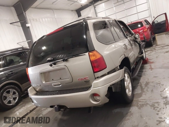2003 GMC Envoy SLT with VIN 1GKDT13S932395367, listed as a IAAI auction lot 41544810 with 142,012 mi miles. Bid and sale history available at carsss.com. Image 15.
