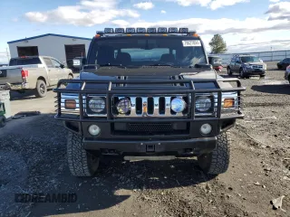 2005 Hummer H2 SUT with VIN 5GRGN22U55H112442, listed as a Copart auction lot 86158414 with 135,411 mi miles and Salvage Title. Bid and sale history available at carsss.com. Image 5.