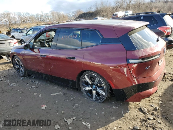 2022 BMW iX xDrive50 with VIN WB523CF05NCK56452, listed as a Copart auction lot 82352873 with 28,965 mi miles. Bid and sale history available at carsss.com. Image 2.